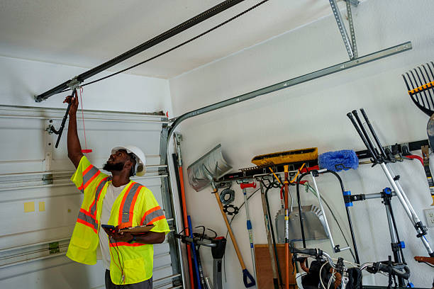 Professional Garage Door Roller Replacement technician working in West Sayville, NY
